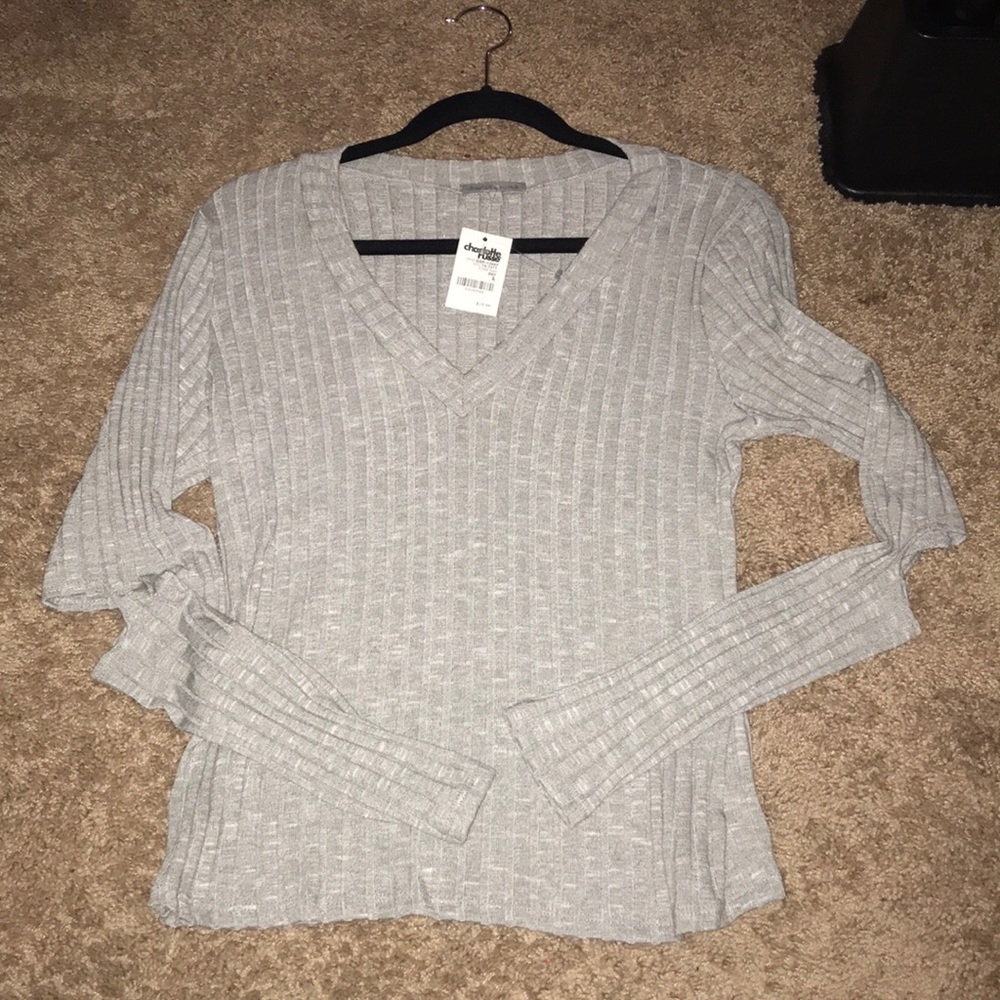 Gray sweater with elbows cut out